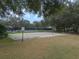 Outdoor sand volleyball court with trees surrounding the perimeter in a community park setting at 3214 Regal Crest Dr, Longwood, FL 32779