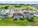 Aerial view of the homes showing screened patios and inground pools at 335 Prestwick Dr, Davenport, FL 33897