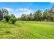 A huge backyard provides ample space for recreation and enjoying the outdoors at 335 Prestwick Dr, Davenport, FL 33897