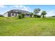An expansive backyard offers plenty of space for outdoor activities and enjoying nature at 335 Prestwick Dr, Davenport, FL 33897