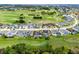 Aerial view of a community with a golf course at 335 Prestwick Dr, Davenport, FL 33897