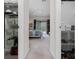 Dual walk-in closets featuring wire shelving and an opening looking into the main bedroom at 335 Prestwick Dr, Davenport, FL 33897
