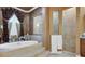 Luxurious bathroom featuring a soaking tub with elegant curtains and a separate walk-in shower at 3358 Fernlake Pl, Longwood, FL 32779