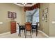 Breakfast nook showcases a table with seating for four, a hutch, and a decorative light fixture at 3358 Fernlake Pl, Longwood, FL 32779