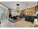 Entertaining space features wet bar and comfortable seating at 3358 Fernlake Pl, Longwood, FL 32779