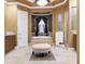 Luxurious bathroom featuring a soaking tub, separate shower, and elegant vanity with granite countertops at 3358 Fernlake Pl, Longwood, FL 32779