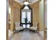 A cozy sitting area features decorative walls, window treatments, and comfortable seating, bathed in natural light at 3358 Fernlake Pl, Longwood, FL 32779