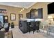 This in-home bar is ideal for entertaining, complete with storage and seating for two at 3358 Fernlake Pl, Longwood, FL 32779
