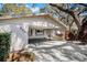 Attached covered two-car carport on this charming home at 3407 Pershing Ave, Orlando, FL 32812