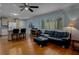 Cozy living room with modern furnishings and seamless transition to the kitchen at 3407 Pershing Ave, Orlando, FL 32812