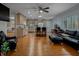 Spacious living room featuring an open floor plan, blending the kitchen with the living area at 3407 Pershing Ave, Orlando, FL 32812
