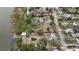 Large waterfront property with defined boundaries and mature landscaping offering scenic waterfront development potential at 3540 Walker Rd, Apopka, FL 32703