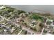 Expansive waterfront property with mature trees and dock outlined in red for property reference at 3540 Walker Rd, Apopka, FL 32703