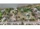 Waterfront lot with mature landscaping, private dock, and clear boundary lines, perfect for building your dream home at 3540 Walker Rd, Apopka, FL 32703