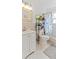 Cozy bathroom featuring a modern vanity, decorative mirror, and a shower with a stylish patterned curtain at 5646 Spring Run Ave, Orlando, FL 32819
