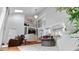 Bright open-concept living room with a vaulted ceiling and stylish decor at 5646 Spring Run Ave, Orlando, FL 32819