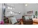 Inviting living room featuring comfortable leather seating and an upper level looking over the space at 5646 Spring Run Ave, Orlando, FL 32819