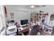The office has hard wood floors, a ceiling fan, and closet with ample storage at 5646 Spring Run Ave, Orlando, FL 32819