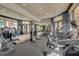 Stay fit in the fitness center, equipped with modern machines, mirrored walls, and ample space for workouts at 5766 Lesabre Dr, Kissimmee, FL 34746