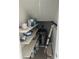Storage space with shelving, various storage containers, and a water heater at 6046 Village Cir # 6046, Orlando, FL 32822