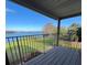 Enjoy lake views from this balcony with a railing and wood deck at 620 Georgetown Dr # 620, Casselberry, FL 32707