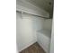 Simple closet with a clothes rod and a shelf at 620 Georgetown Dr # 620, Casselberry, FL 32707