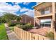 Exterior of the building featuring a brick facade, balcony, brick patio, and sliding glass door at 620 Georgetown Dr # 620, Casselberry, FL 32707