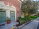 Close up of unit front showing unit door, some landscaping, and sidewalk at 620 Georgetown Dr # 620, Casselberry, FL 32707