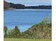 Scenic lake view showing rowers on the water at 620 Georgetown Dr # 620, Casselberry, FL 32707