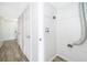 Bright laundry area with ample storage space and modern wood-look tile flooring at 620 Georgetown Dr # 620, Casselberry, FL 32707
