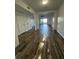 Bright living room features wood-look tile, neutral paint, with patio access at 620 Georgetown Dr # 620, Casselberry, FL 32707