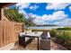 Outdoor patio featuring a table and chairs, perfect for enjoying waterfront views and relaxing outdoors at 620 Georgetown Dr # 620, Casselberry, FL 32707