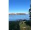 Scenic waterfront view with picnic table and lake at 620 Georgetown Dr # 620, Casselberry, FL 32707