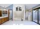 Bathroom features large soaking tub, walk-in shower, and vanity with sink at 685 Vistawilla Dr, Winter Springs, FL 32708