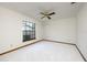 Bedroom featuring neutral carpet and a view to the front yard at 685 Vistawilla Dr, Winter Springs, FL 32708