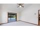 Bedroom featuring carpet, ceiling fan, and sliding door access to the pool at 685 Vistawilla Dr, Winter Springs, FL 32708