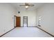 Bedroom featuring carpet, ceiling fan, a window, and a door leading to the bathroom at 685 Vistawilla Dr, Winter Springs, FL 32708