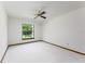 Bedroom featuring neutral carpet and a view to the back yard at 685 Vistawilla Dr, Winter Springs, FL 32708