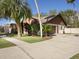 Charming home featuring a well-manicured lawn and a paved driveway leading to a two-car garage at 685 Vistawilla Dr, Winter Springs, FL 32708