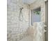Shower features neutral tile and window at 685 Vistawilla Dr, Winter Springs, FL 32708