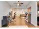 Open floor plan showcases a cozy living room, home office, and ample space at 7517 Laureate Blvd # 4206, Orlando, FL 32827