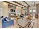 Relaxing lounge area with fireplace, sofas, and ample seating at 7517 Laureate Blvd # 4206, Orlando, FL 32827