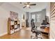 Inviting home office with lots of natural light, wood floors and ceiling fan at 7517 Laureate Blvd # 4206, Orlando, FL 32827