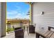 Outdoor patio with seating area and view of the city skyline at 7517 Laureate Blvd # 4206, Orlando, FL 32827