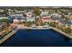 Aerial view of a town featuring colorful buildings near the lake, showcasing shopping and dining at 819 Veranda Pl, Celebration, FL 34747