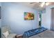 Comfortable bedroom with a ceiling fan, a flat screen TV and view to an adjacent room at 8508 Alveron Ave # 1, Orlando, FL 32817