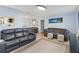Cozy living room with tile flooring, neutral walls, and comfortable seating at 8508 Alveron Ave # 1, Orlando, FL 32817