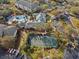 Overhead view of the community, showing a pool, tennis courts, and attractive landscaping at 8929 Legacy Ct # 106, Kissimmee, FL 34747