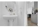 Bathroom with vessel sink and decor at 925 Conch Rd, Davenport, FL 33896