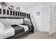 Bedroom features bunkbeds, neutral carpet, and decor at 925 Conch Rd, Davenport, FL 33896